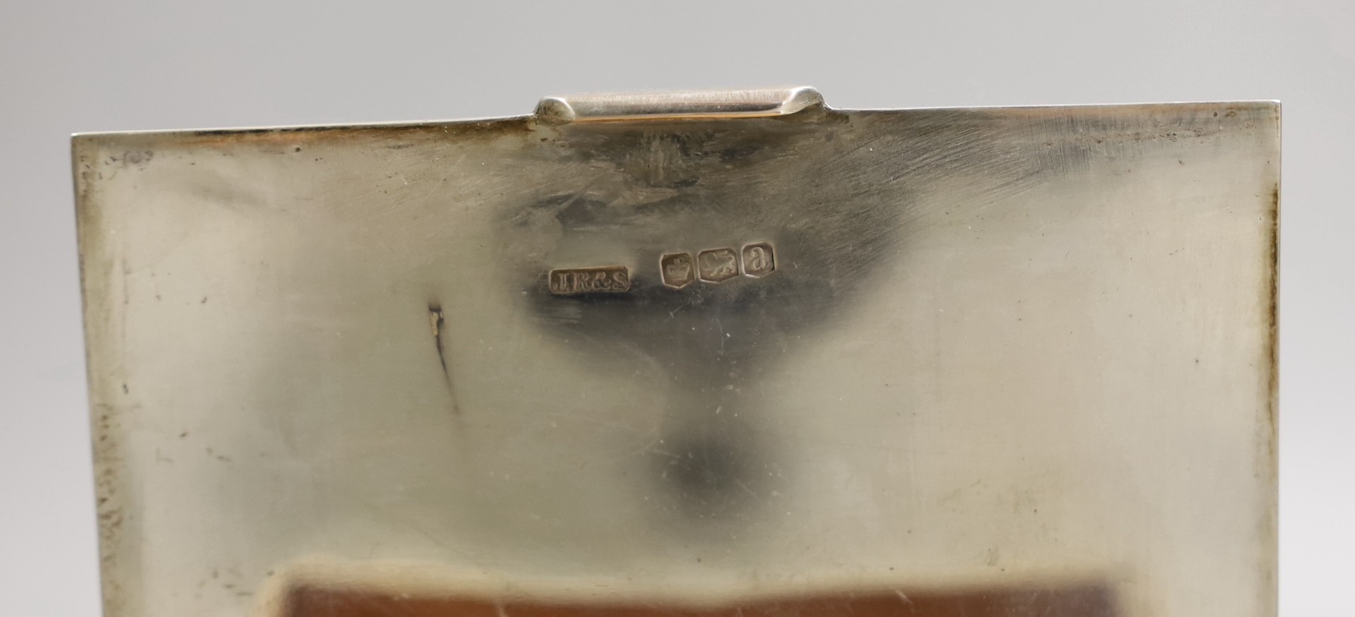 A George V silver mounted cigarette box, 11.5cm and other small sundry silver and plated items including napkin rings, condiments and small dish.